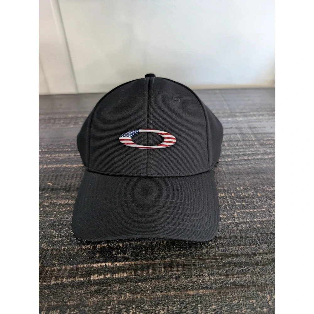 OAKLEY TINCAN Men's USA American Flag Logo Black Hat S/M Stretch Fit Cap 911545
